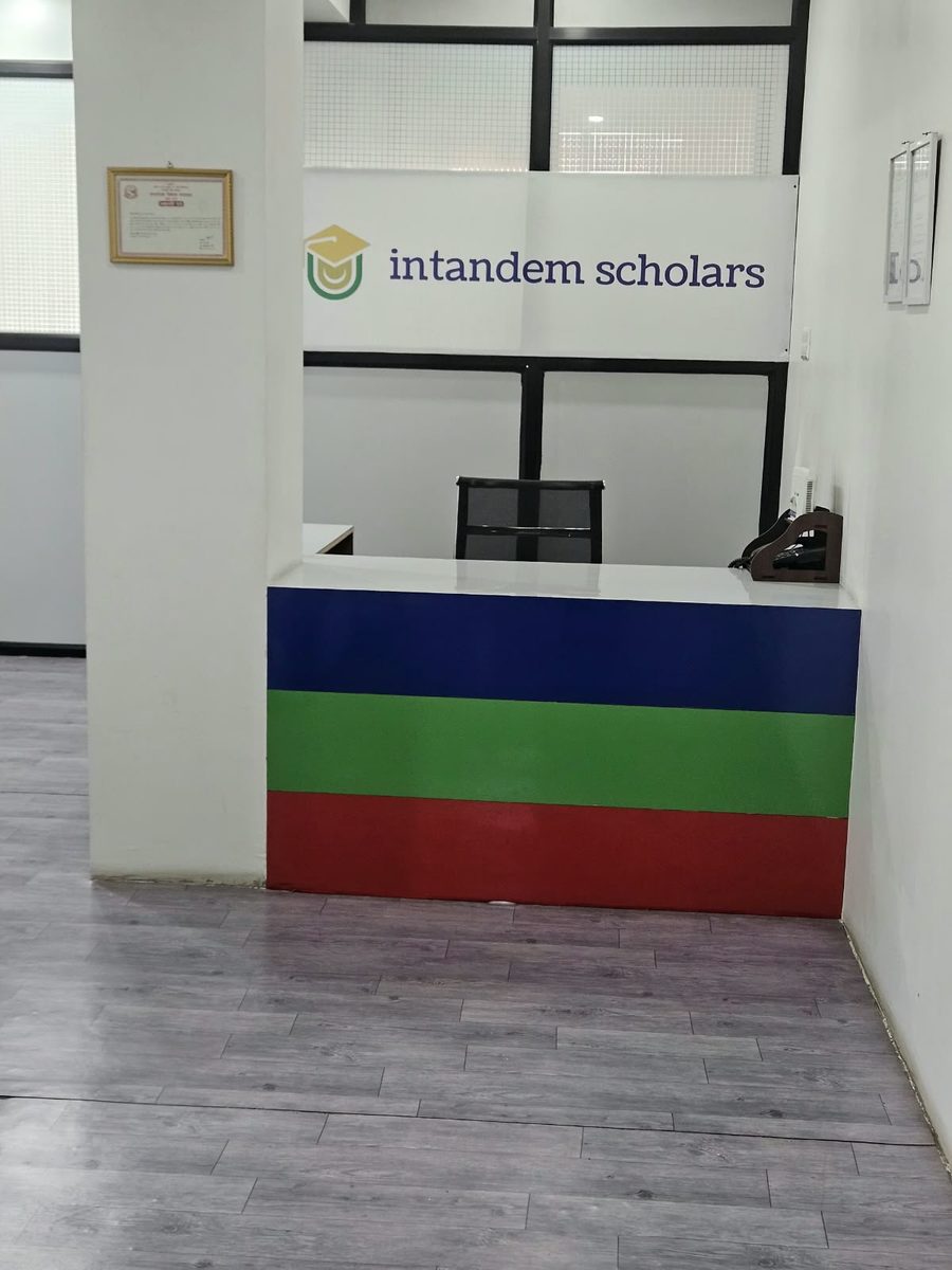 Reception desk with the Intandem Scholars logo at the office in Old Baneshwor, Kathmandu